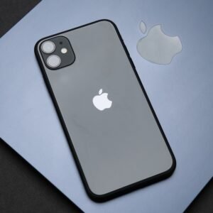 Stylish Apple iPhone on a MacBook, showcasing modern technology and design.